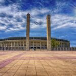 Olympiastadion, Berlin, showcasing its architecture and vibrant atmosphere for frontal view.
