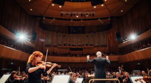Woman playing the violin at the Philharmonic Orchestra in vibrant Berlin, Germany.